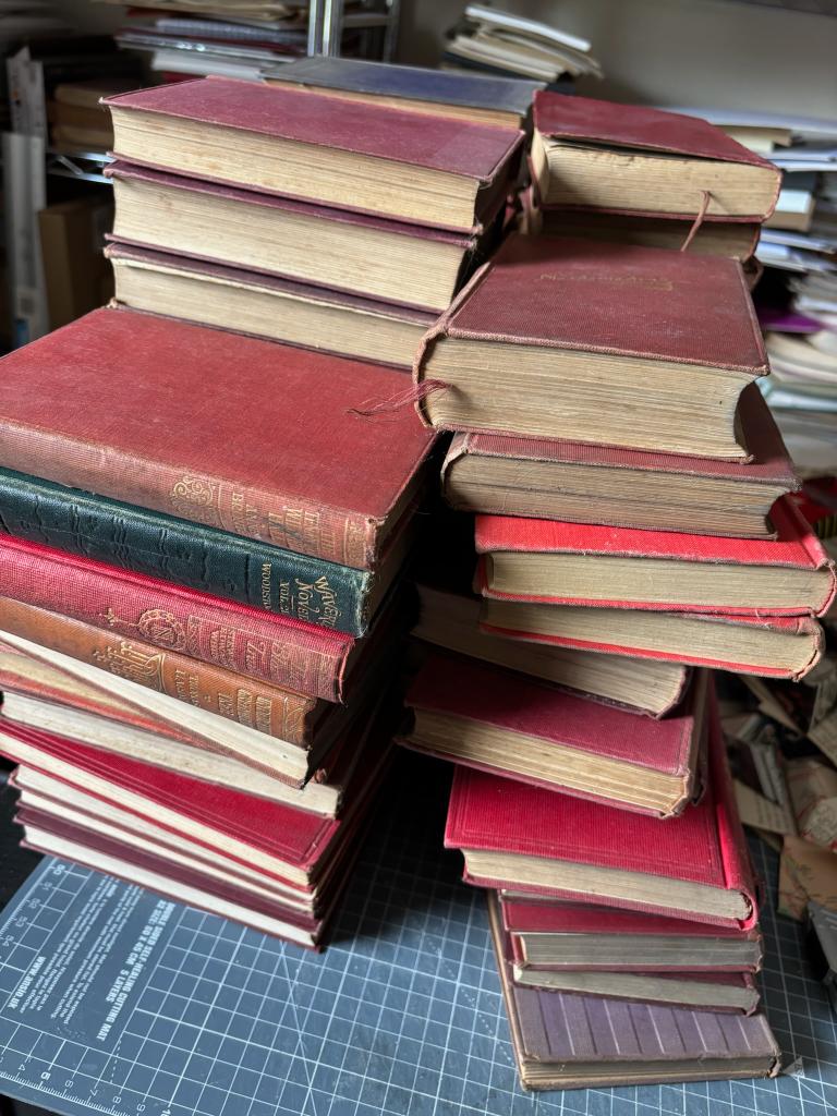 Stacks of vintage books in the Pixies & Sprites workshop